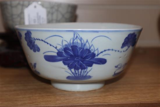 A Chinese crackle glaze bowl, early 20th century blue and white bowl and a wood stand largest diameter 17cm